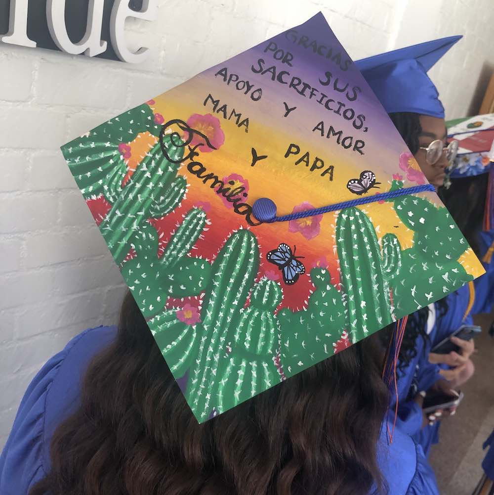 Decorated graduation cap with a note of thanks